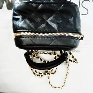 Fashion Nova sexy little go to bag on black and gold,New with tags